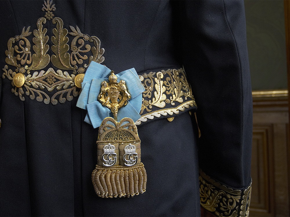 Cabinet chamberlain's key. Close-up of reverse with gold embroidery on court uniform. 