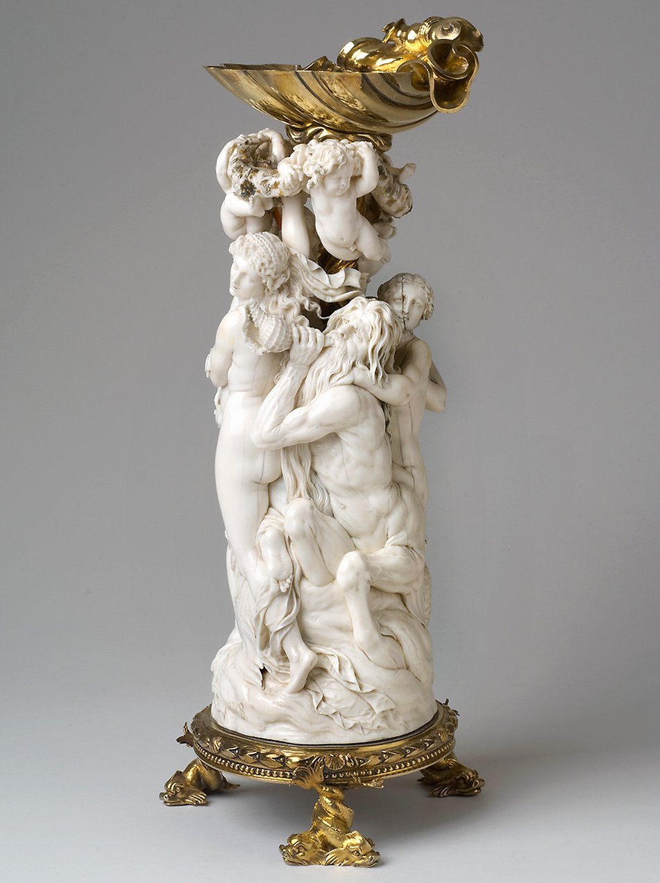Ivory and silver salt cellar, depicting the triumph of Venus. Made by Georg Petel in Antwerp during 1627–28, from drawings by Peter Paul Rubens. Purchased at auction on behalf of Queen Kristina after Ruben's death in 1646.