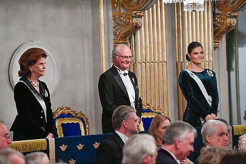 The King, The Queen and The Crown Princess Couple at the Swedish Academy's formal gathering. 